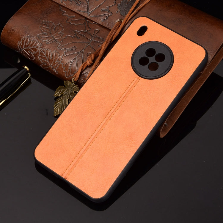 For Huawei Y9a Shockproof Sewing Cow Pattern Skin PC + PU + TPU Case(Orange)