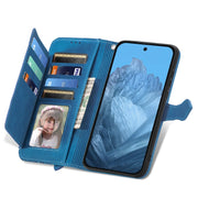 For Google Pixel 9 Pro Embossed Flower Zipper Leather Phone Case(Blue)