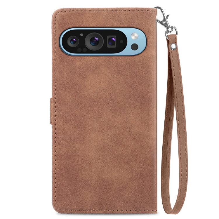 For Google Pixel 9 Embossed Flower Zipper Leather Phone Case(Brown)