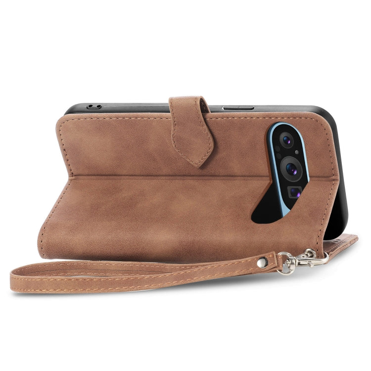 For Google Pixel 9 Embossed Flower Zipper Leather Phone Case(Brown)