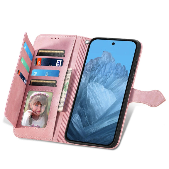For Google Pixel 9 Embossed Flower Zipper Leather Phone Case(Pink)