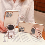 For iPhone 16 Plus Electroplating Astronaut Holder Phone Case(Pink)