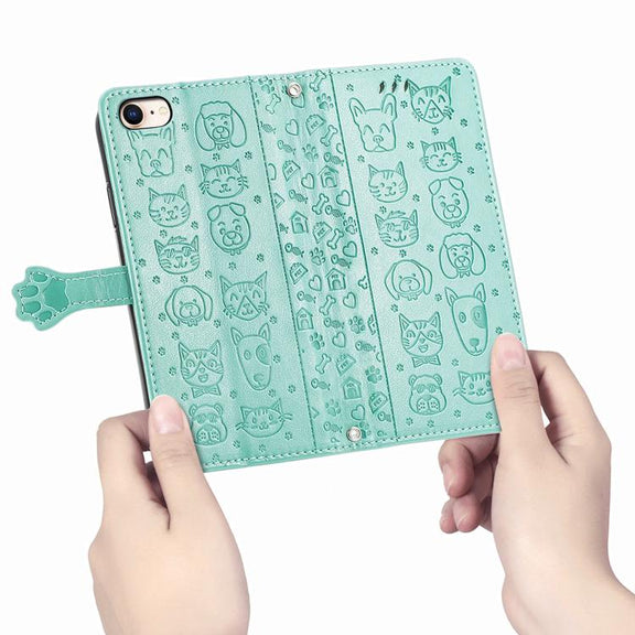 For iPhone 16e Cat and Dog Embossed Leather Phone Case(Green)