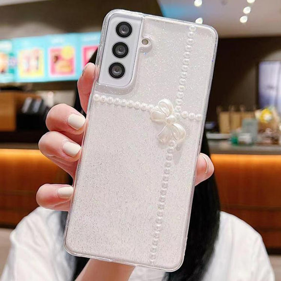 For Samsung Galaxy S25 5G Pearl Bow Glitter Epoxy TPU Phone Case(Cross Knots)