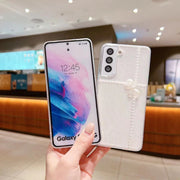 For Samsung Galaxy S25 Ultra 5G Pearl Bow Glitter Epoxy TPU Phone Case(Cross Knots)