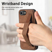 For iPhone 16e Retro Wristband Holder Leather Back Phone Case(Brown)