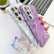For Samsung Galaxy S25 5G Plating Glitter Texture Chain Wristband TPU Phone Case with Lens Film(White Shell Pattern)