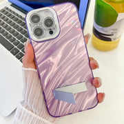 For iPhone 16e Plating Glitter Texture Fold Holder TPU Phone Case with Lens Film(Purple Shell Pattern)
