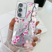 For Samsung Galaxy S25+ 5G Electroplating Flowers Plants Texture Wristband TPU Phone Case(Plum Flower FL6)