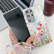 For Samsung Galaxy S25 5G Electroplating Flower Texture Wristband TPU Phone Case(Red Plum Blossom SH2)