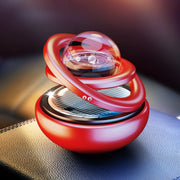 Interstellar Vast Solar Rotating Car Aromatherapy Ornaments, Color: Red