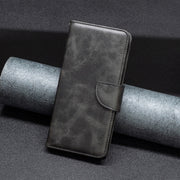 For iPhone 15 Pro Lambskin Texture Pure Color Flip Leather Phone Case(Black)
